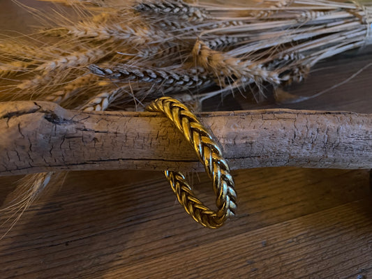 Bracelet bouddhiste tressé doré